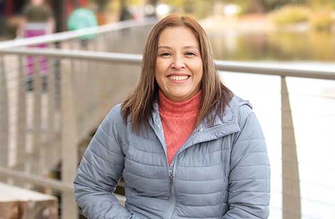 Happy woman smiling at the camera