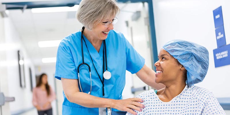 nurse with patient in wheelchair