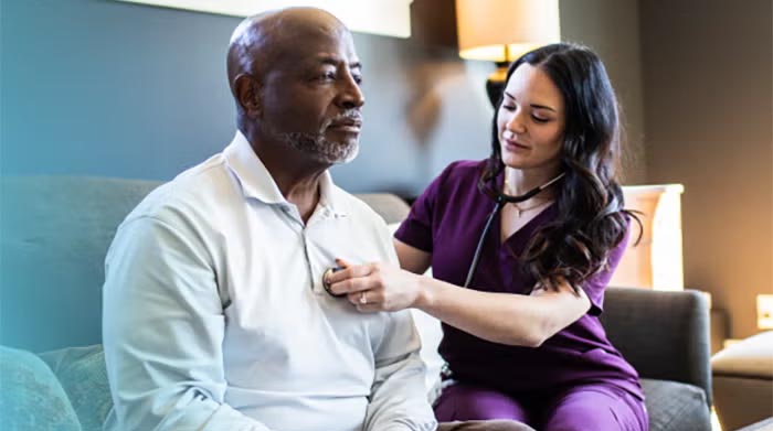 senior male patient with nurse