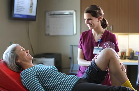 orthopedist with patient